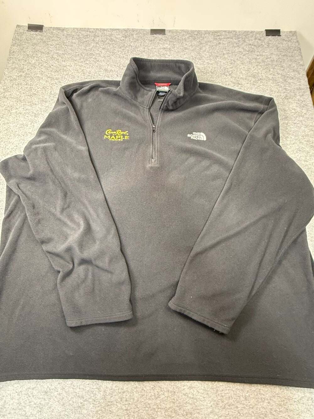 The North Face Black 1/2 Zip Fleece Pullover with Crown Royal Maple Finished